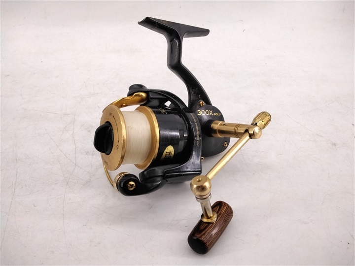 Sold at Auction: MITCHELL 300X GOLD FISHING REEL